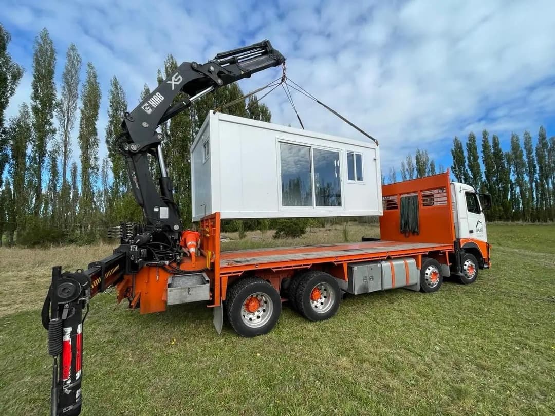 Portable Building Specialists cabin delivery truck